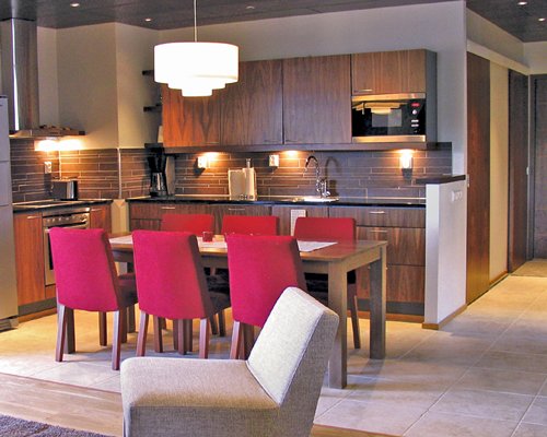 An open plan dining and kitchen area.