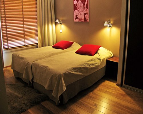 Bedroom with a twin bed and outside view.