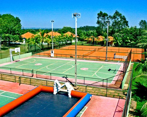 A basketball court and two outdoor tennis courts.