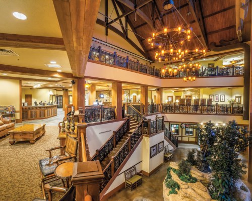 AN INTERIOR VIEW OF A MULTI STORY RESORT UNIT.