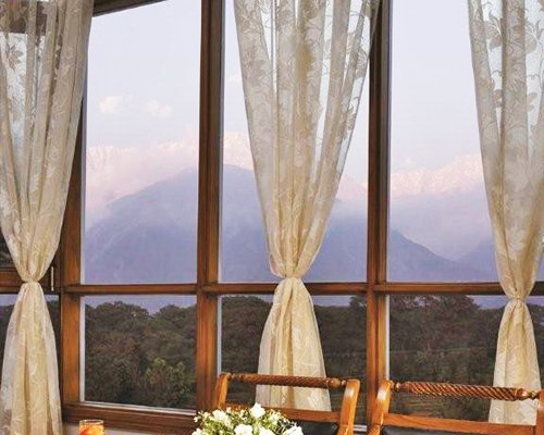 A well furnished dining area with outside view.
