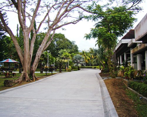 An exterior view of the Club Balai Isabel resort and a road.