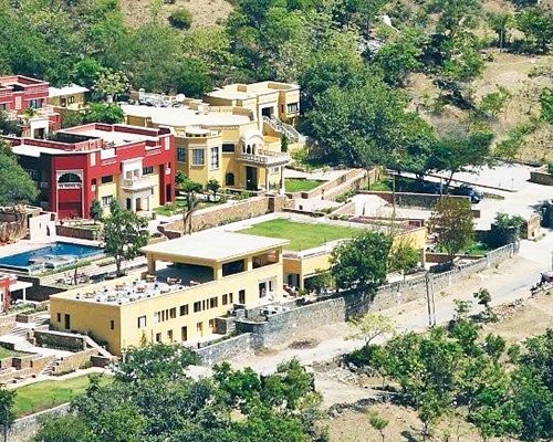 An exterior view of the resort properties alongside the trees.