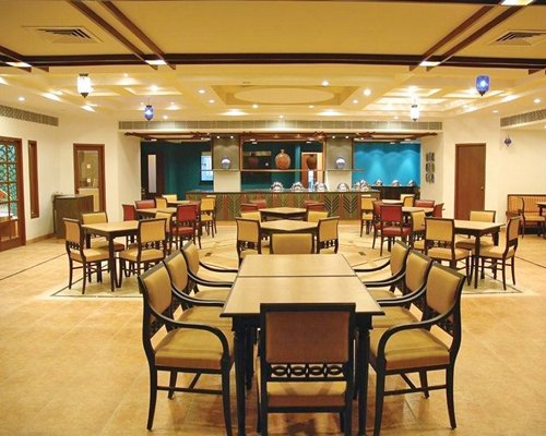 An indoor restaurant at Club Mahindra Kumbhalgarh.