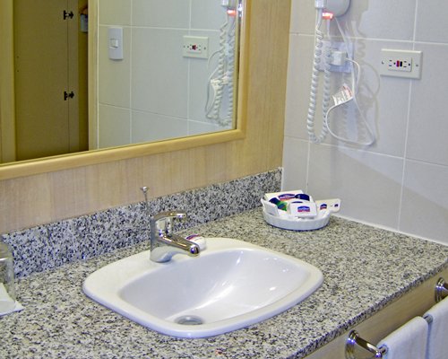 A bathroom with a single sink.
