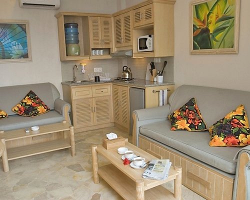 An open plan living and kitchen area.