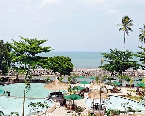 A view of the resort property alongside the ocean.