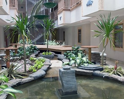 An exterior scenic landscape alongside resort units.