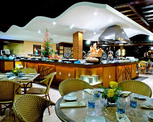 An indoor fine dining restaurant with a buffet access.