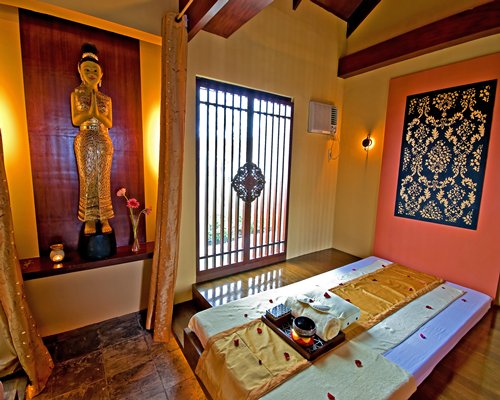 A spa room with an outside view.