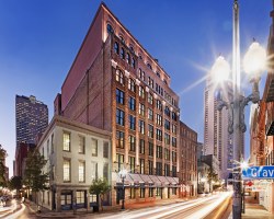 STREET VIEW OF WYNDHAM LA BELLE MAISON RESORT AT NIGHT.