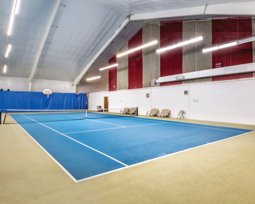 AN INDOOR TENNIS COURT.