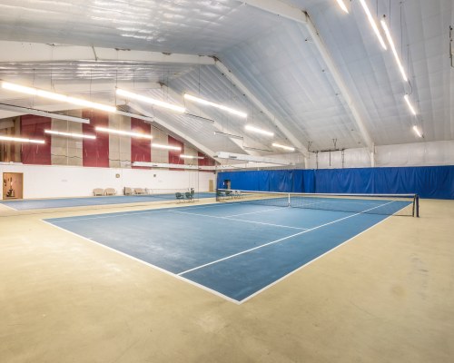 AN INDOOR TENNIS COURT.