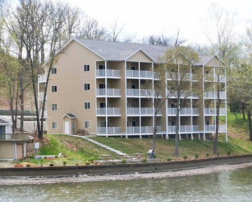 Exterior view of the Nantucket Bay Condominiums alongside the lake.