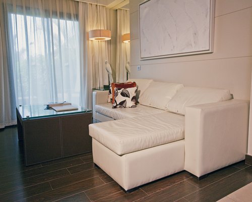 A well furnished living room with outside view.