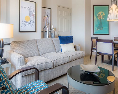 A well furnished living room and dining area.
