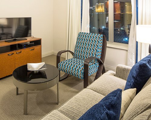 A well furnished living room with television.