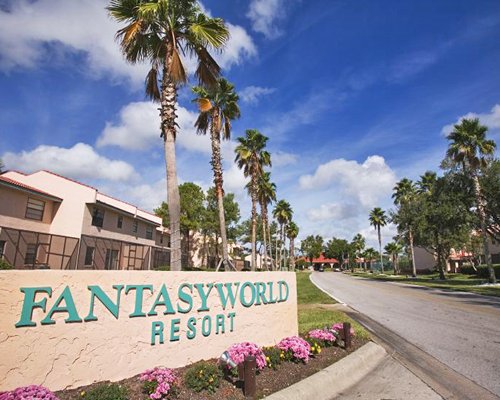 Signboard of the resort alongside the resort and the road.