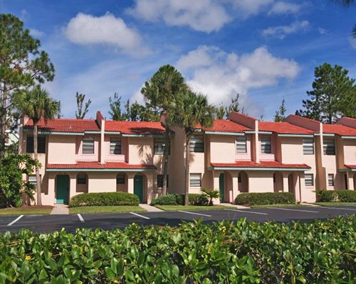 Scenic exterior view of GEVC @ Fantasy World Club Villas with a pathway.