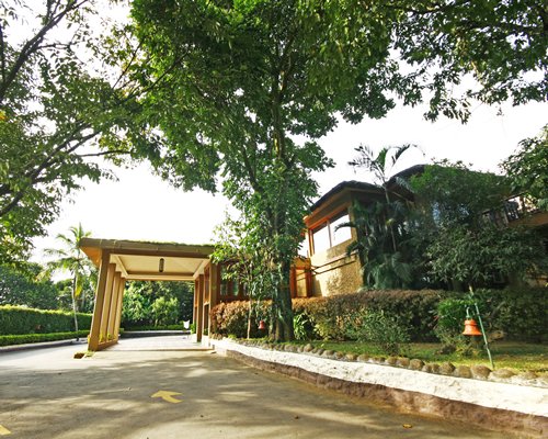 A scenic pathway alongside resort units.