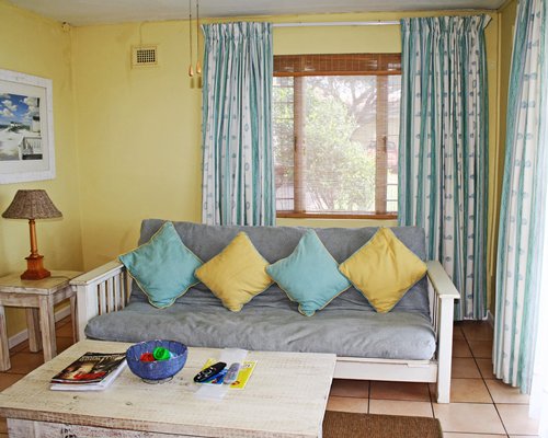 A well furnished living room with outside view.