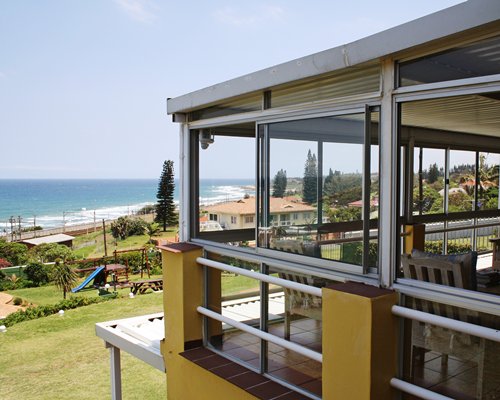 Balcony view of the resort alongside the ocean.