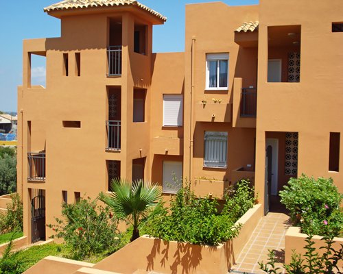 Scenic exterior view of Montemar Natura Resort with multiple balconies.