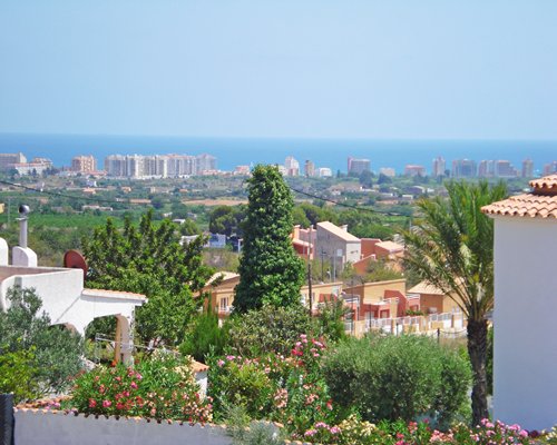 View of the resort property with flowering shrubs.