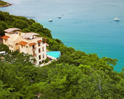 An aerial view of the resort property alongside the beach.