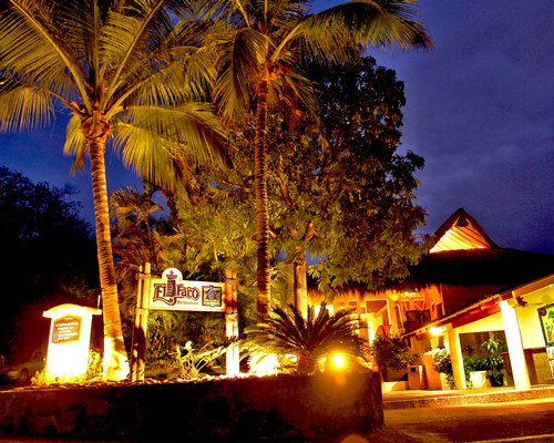 A scenic exterior view of the resort at night.