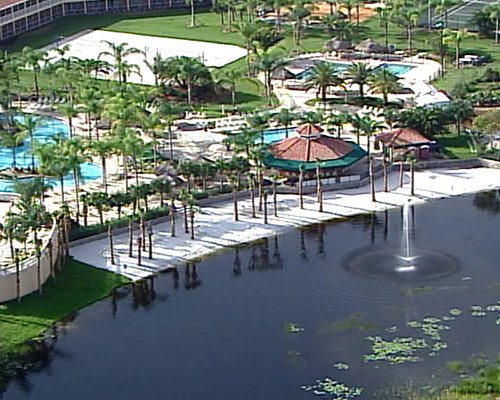 An aerial view of the resort properties alongside the waterfront.