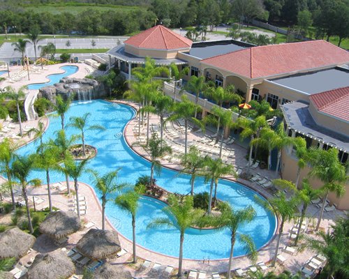 Exterior view of Caliente Tampa with alongside an outdoor swimming pool.