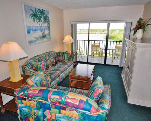 A well furnished living room with a patio.