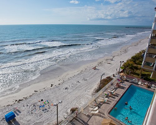 A view of the resort property alongside the ocean.