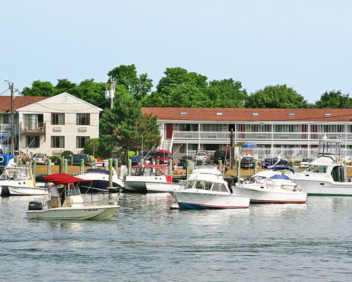 An exterior view of the resort with a marina.