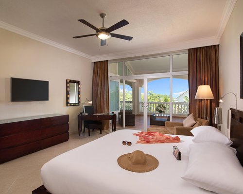 A well furnished bedroom with two beds.