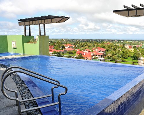 An outdoor swimming pool in the resort property.