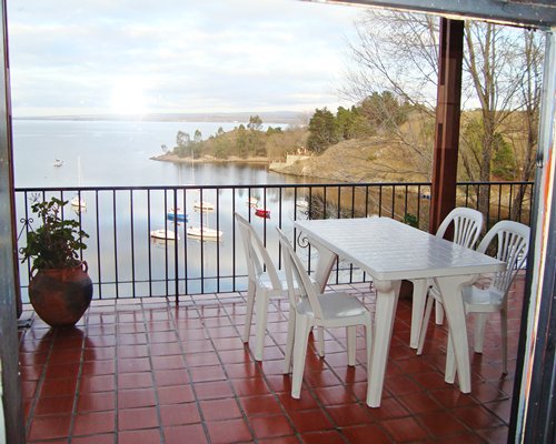 View of the lake with boats from the balcony.