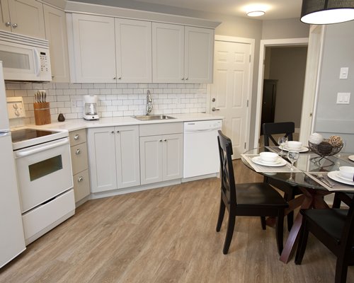 An open plan kitchen and dining area.