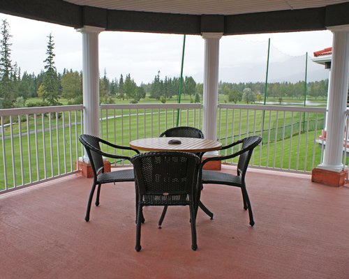 Balcony with patio table.