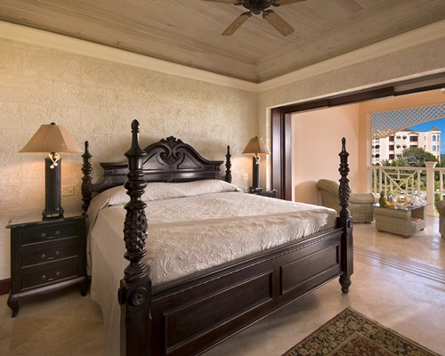 A well furnished bedroom with a king bed.