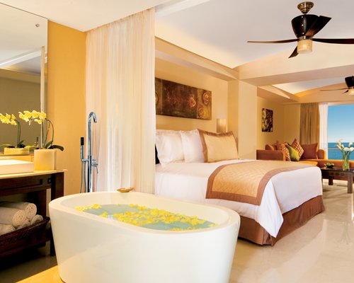 Bedroom with Open Luxury Bath at Dreams Villamagna Nuevo Vallarta