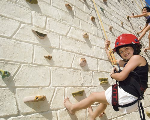 A kid bouldering.