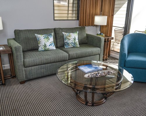 A well furnished living room and dining area.