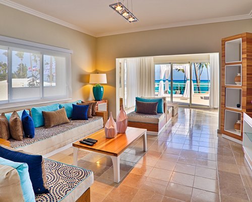 A well furnished living room and dining area.