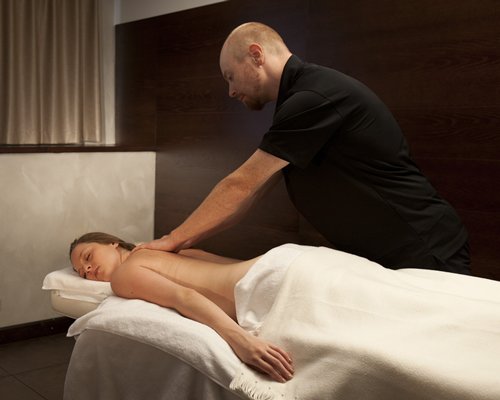 A woman enjoying a massage.