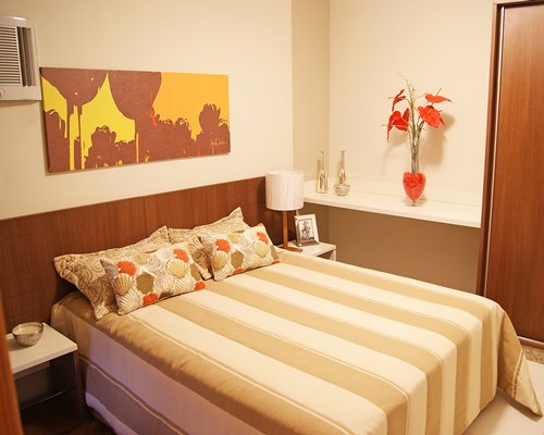 A well furnished bedroom with double bed.