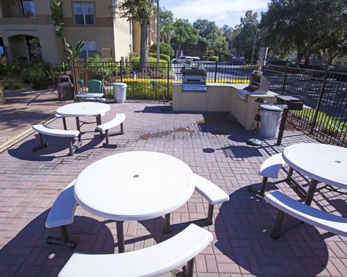 An outdoor picnic area with barbecue grills.