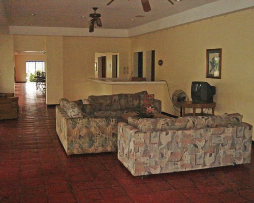 A well furnished living room with a television.