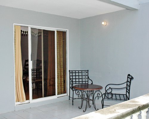 A view of the patio furniture in the balcony.